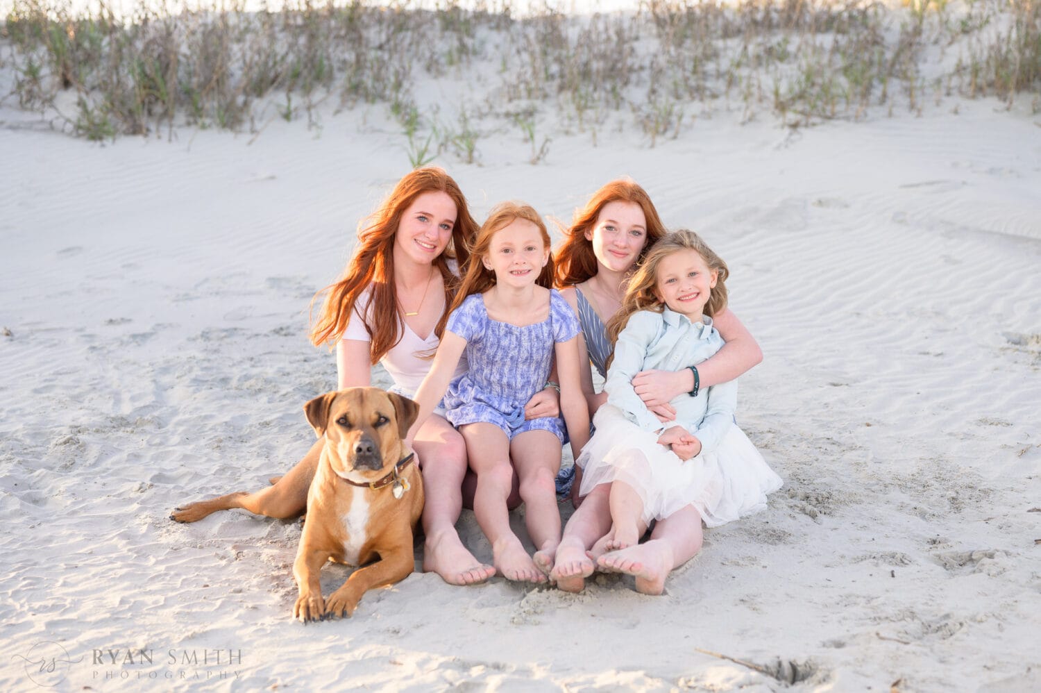 Mom and dad with their 4 girls and dog on the beach - Ocean Isle Beach