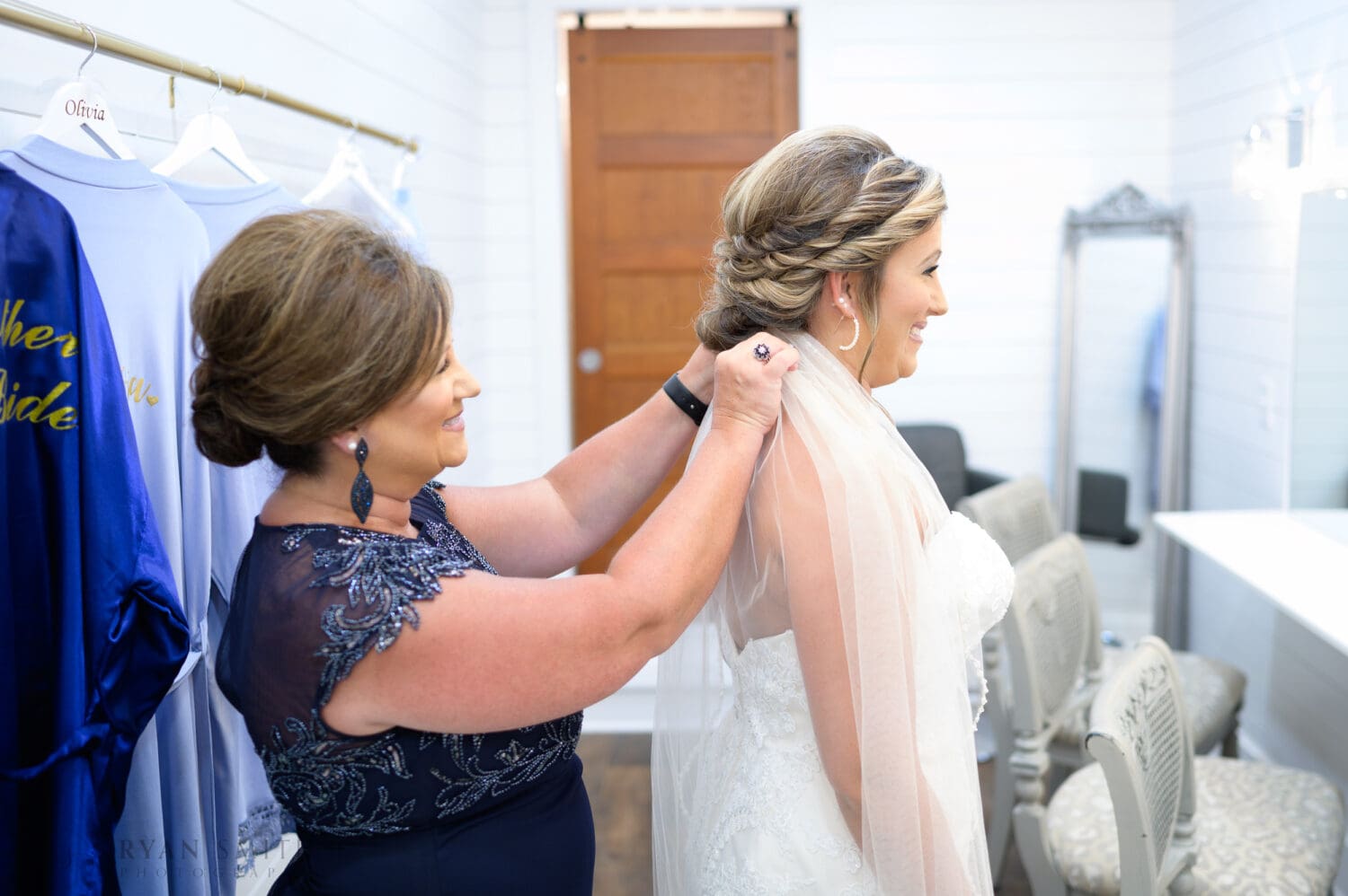 Mother helping bride with veil - The Peanut Warehouse - Conway