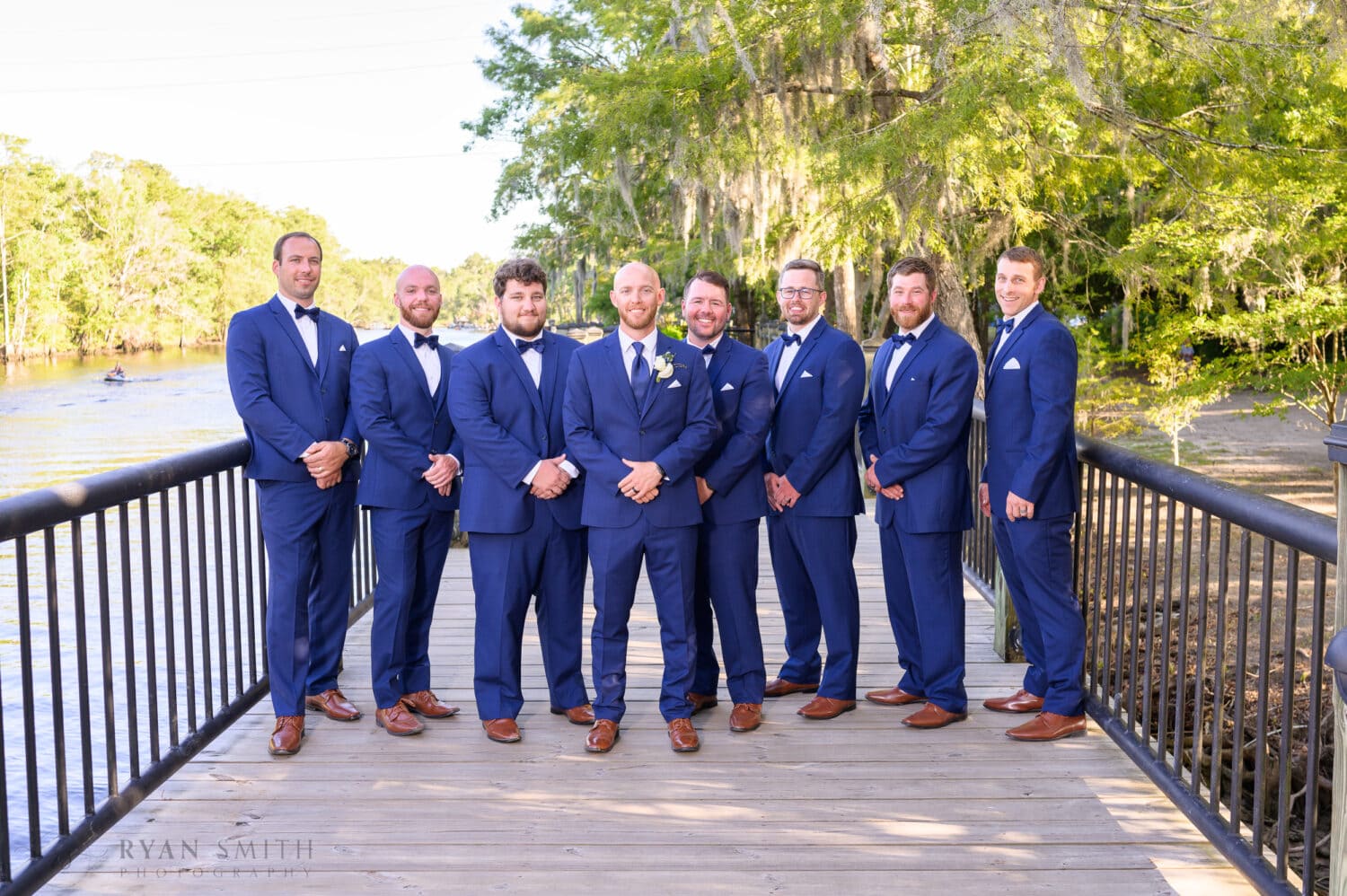 Pictures with the groomsmen - The Conway Riverwalk