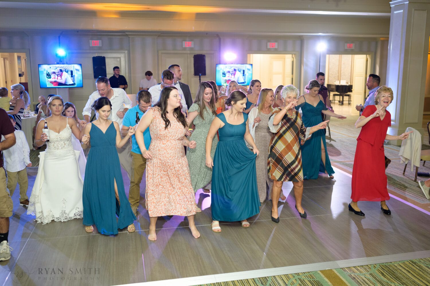 Fun dancing during the reception - Dunes Golf & Beach Club