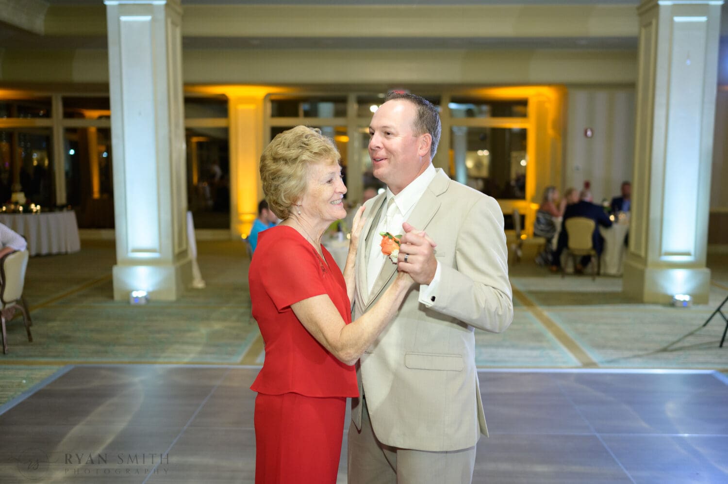 Groom dancing with his mother - Dunes Golf & Beach Club