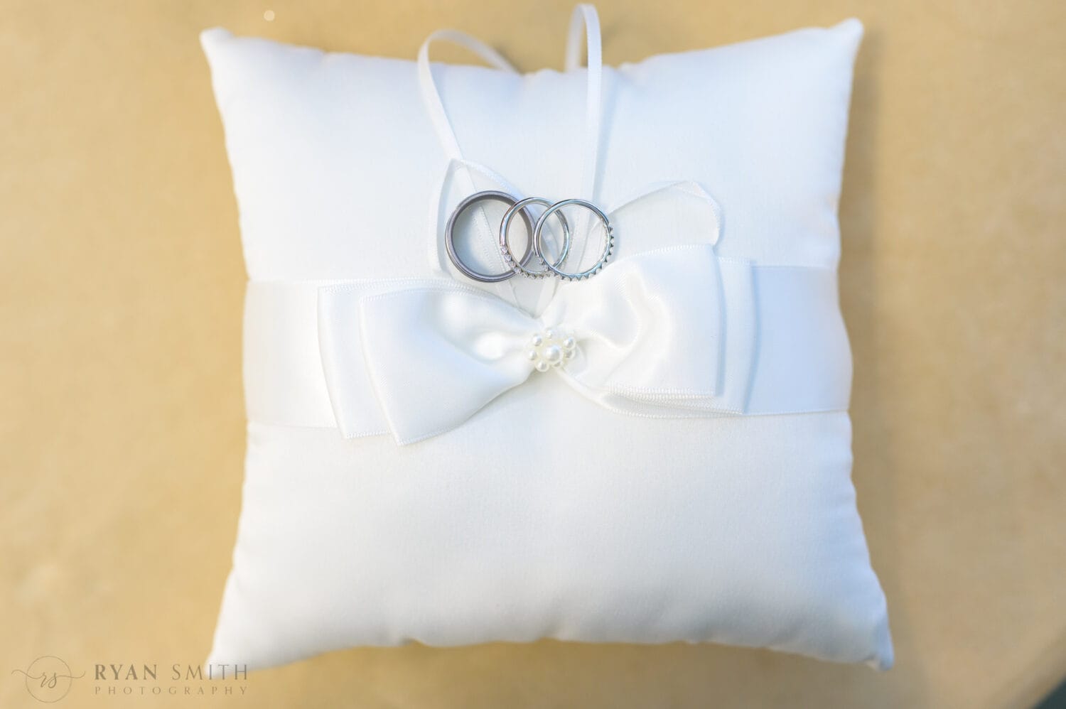 Rings laying on a pillow - Dunes Golf & Beach Club