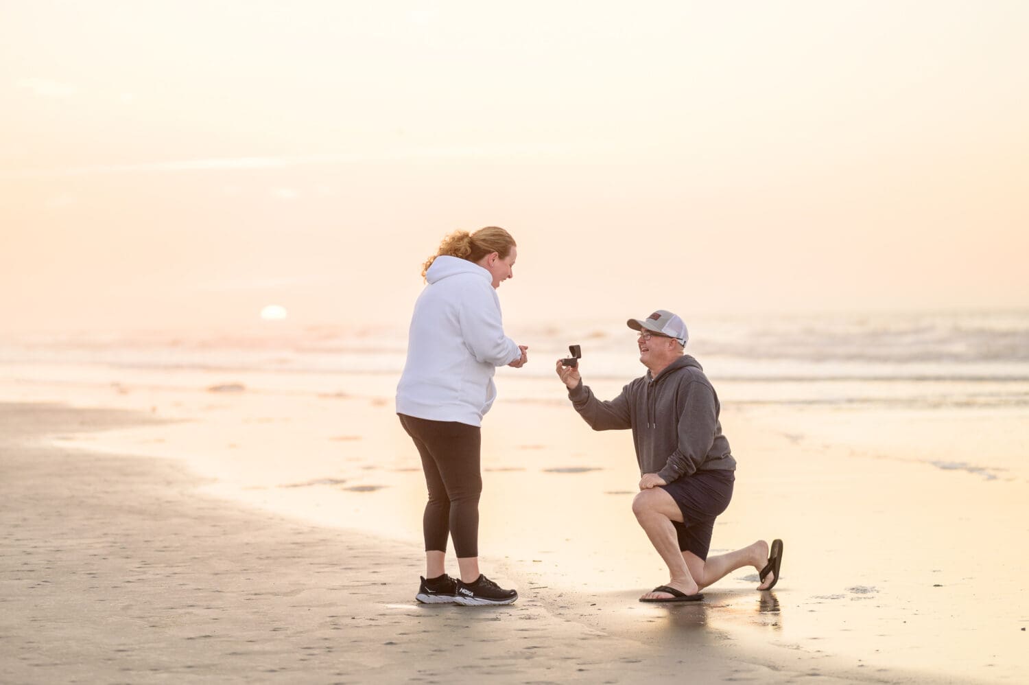 Surprise proposal at sunrise - Sunset Beach