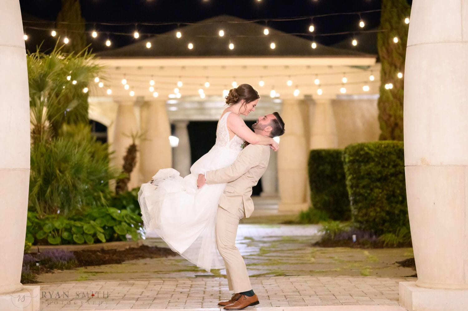 Lifting bride into the air at night in the courtyard - 21 Main Events