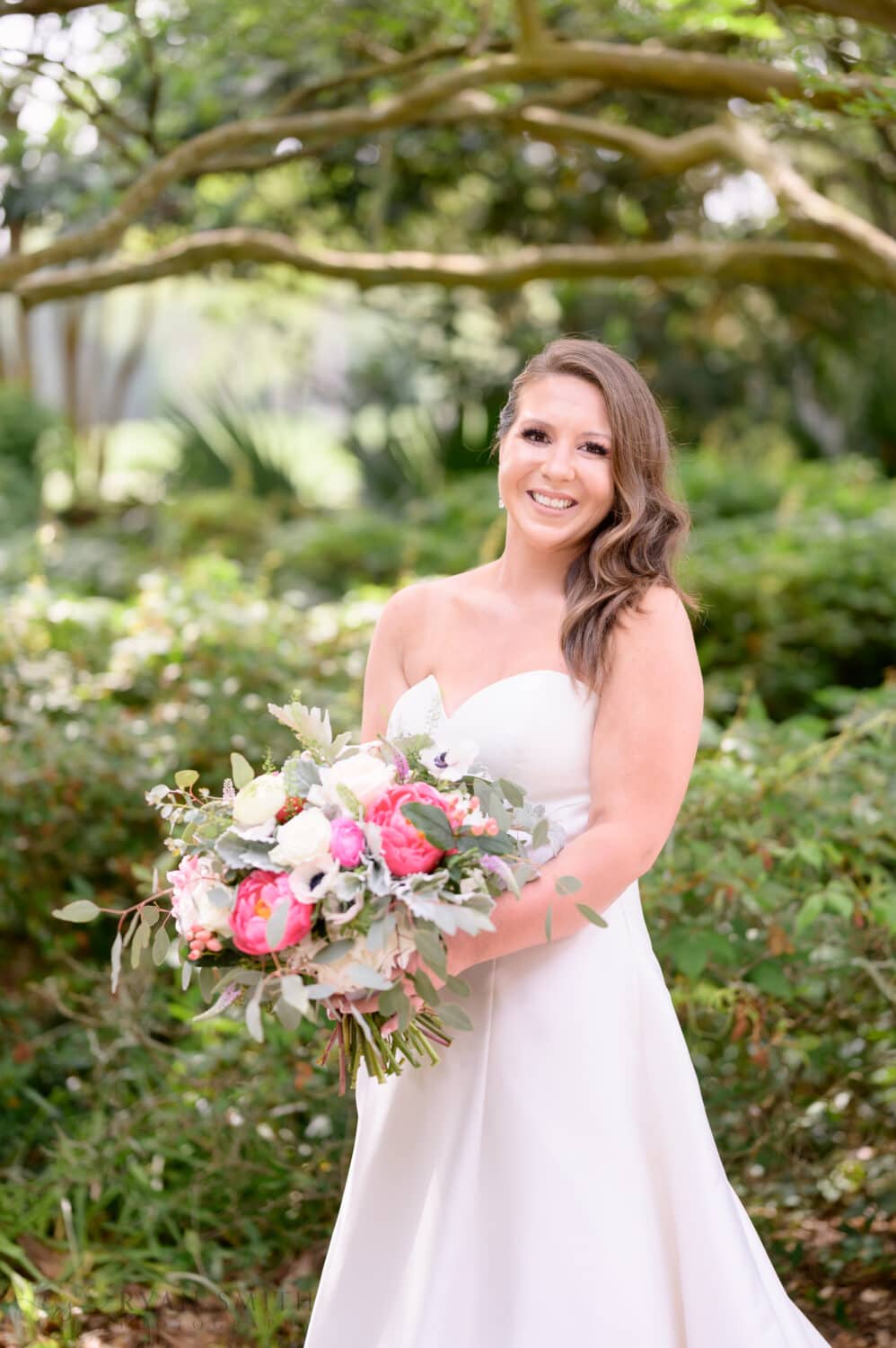 Bride standing in front of the greenery - Pine Lakes Country Club