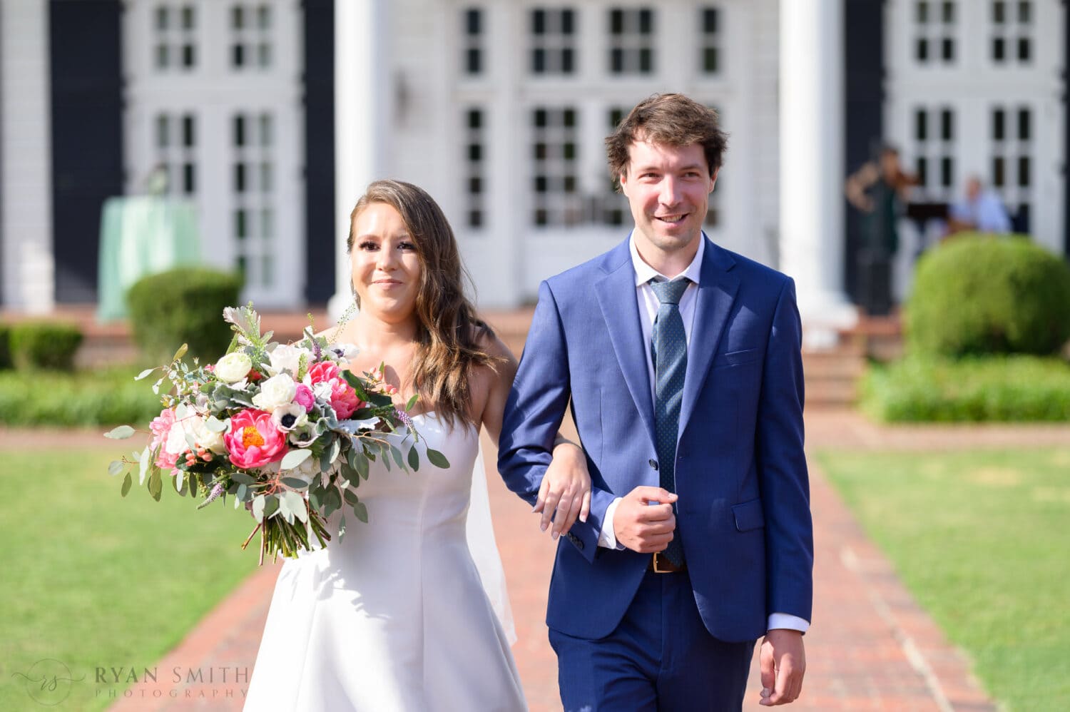 Bride walking with her brother down the aisle - Pine Lakes Country Club