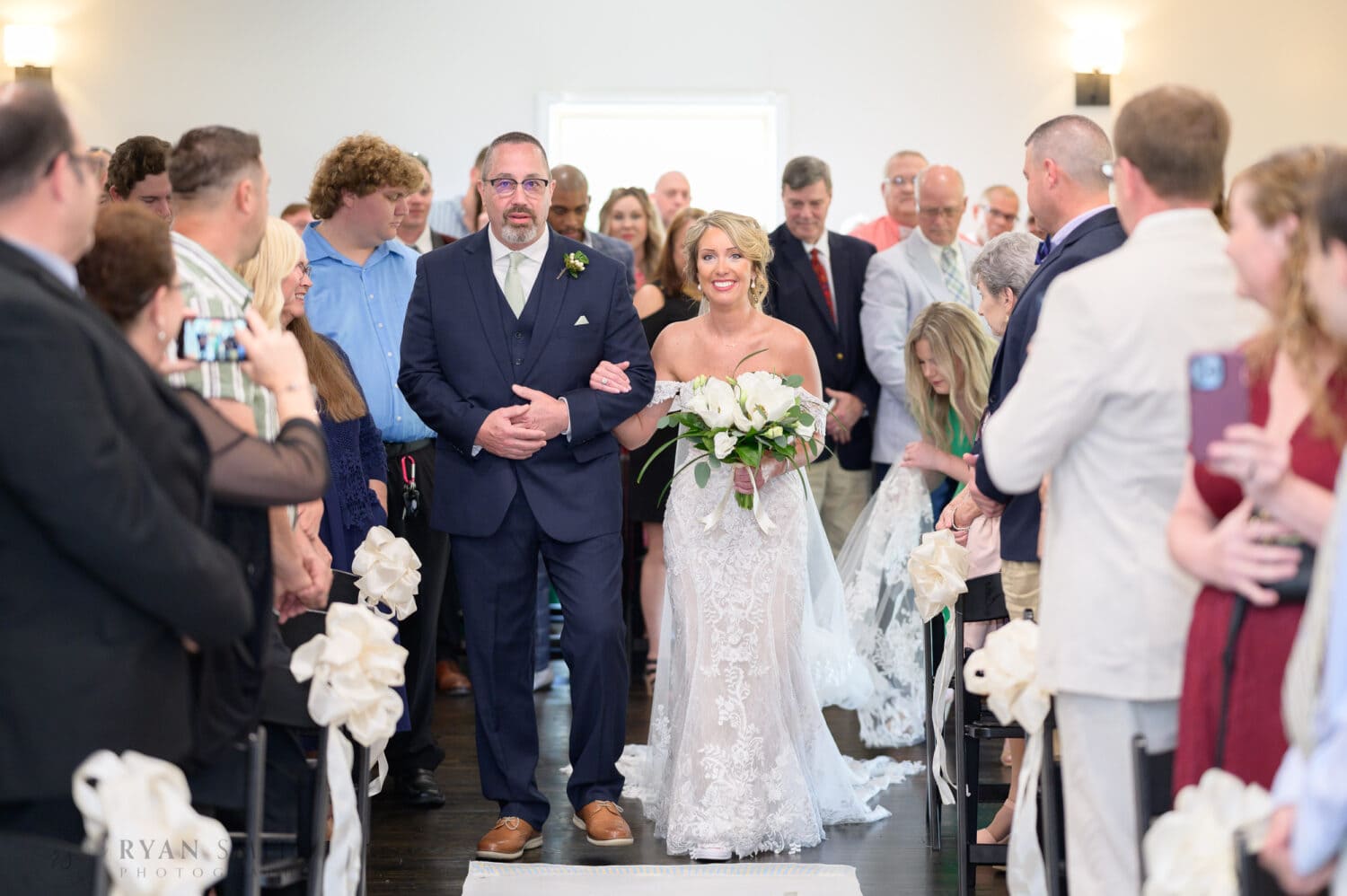 Bride walking with the father down the aisle - The Village House at Litchfield