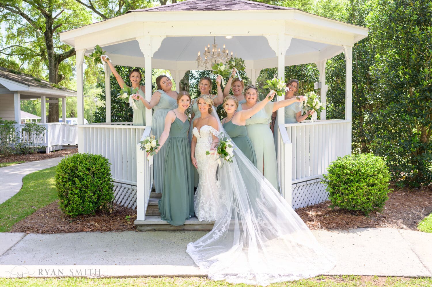 Bride with her bridesmaids in the gazebo - The Village House at Litchfield