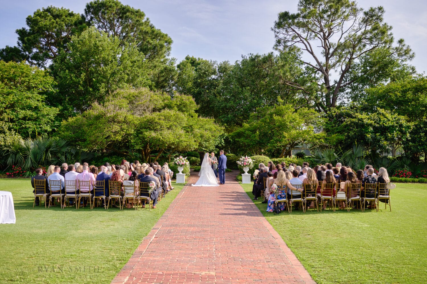 Ceremony on the back lawn - Pine Lakes Country Club