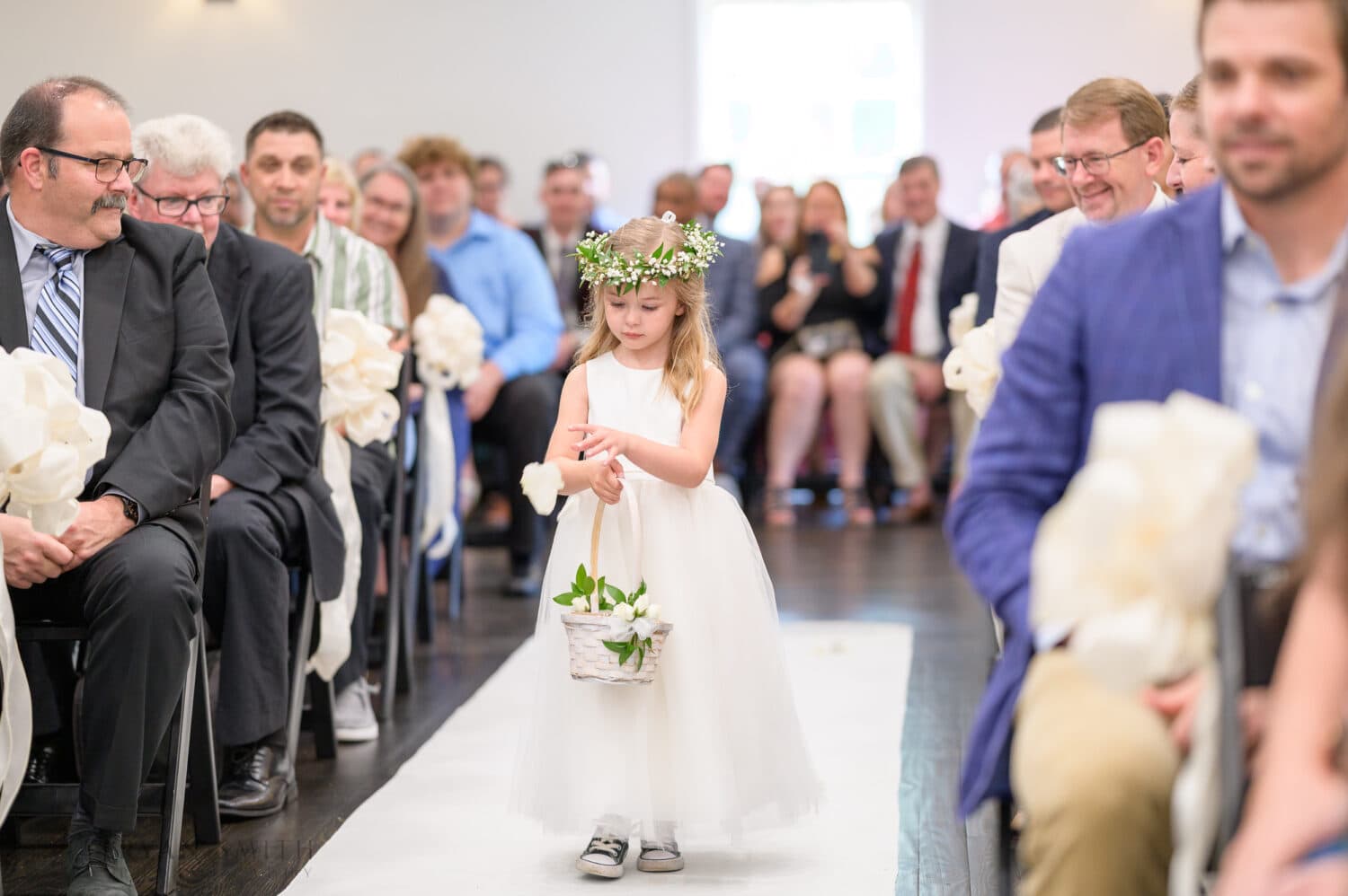 Flower girl walking down the aisle - The Village House at Litchfield