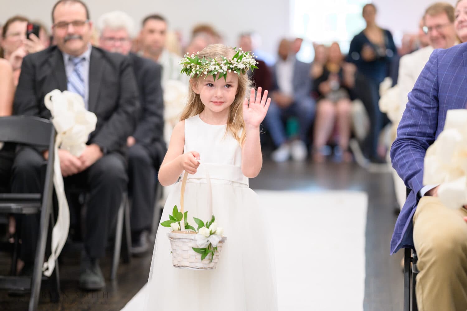 Flower girl walking down the aisle - The Village House at Litchfield