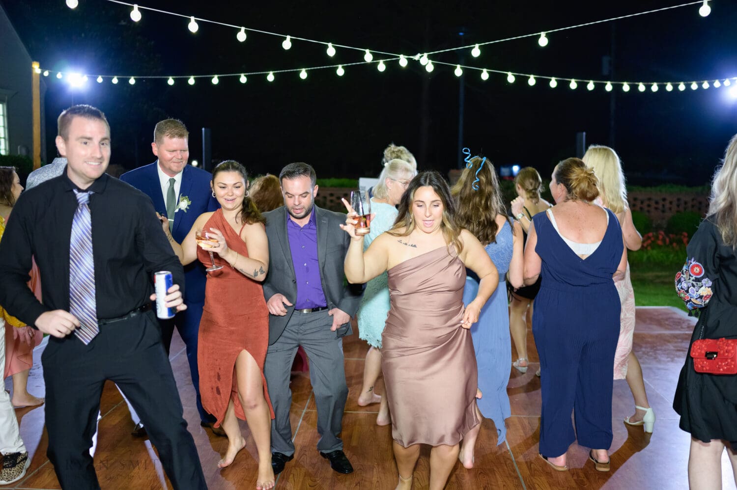 Fun on the dance floor outdoors - Pine Lakes Country Club