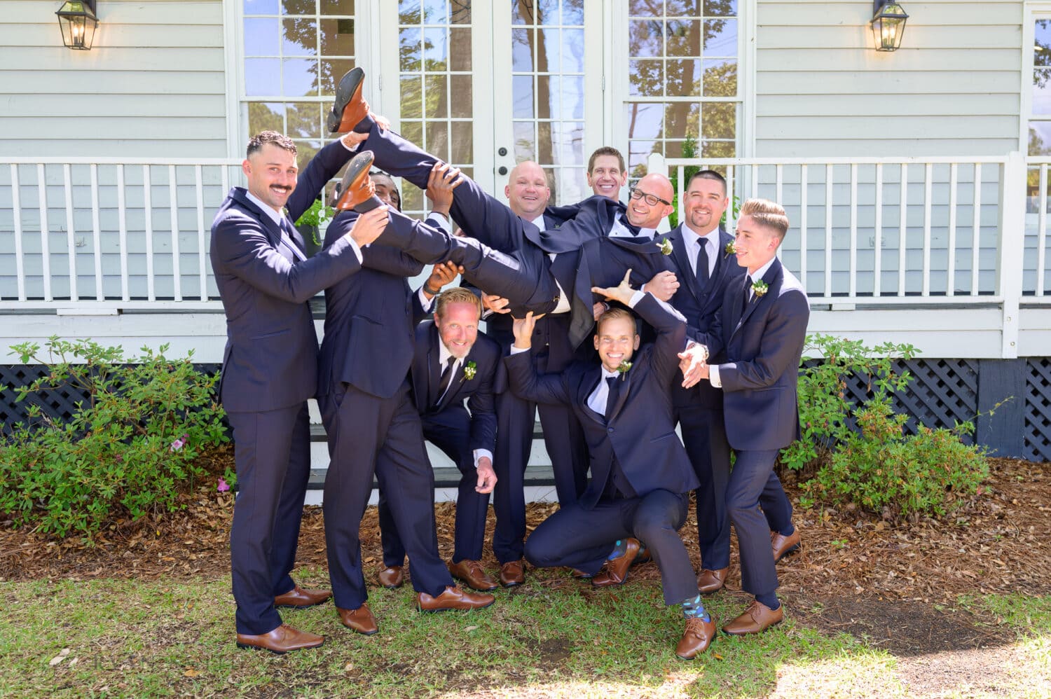 Fun picture with the groomsmen - The Village House at Litchfield