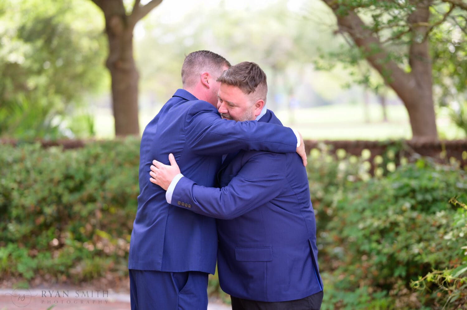 Groom hugging his brother - Pine Lakes Country Club