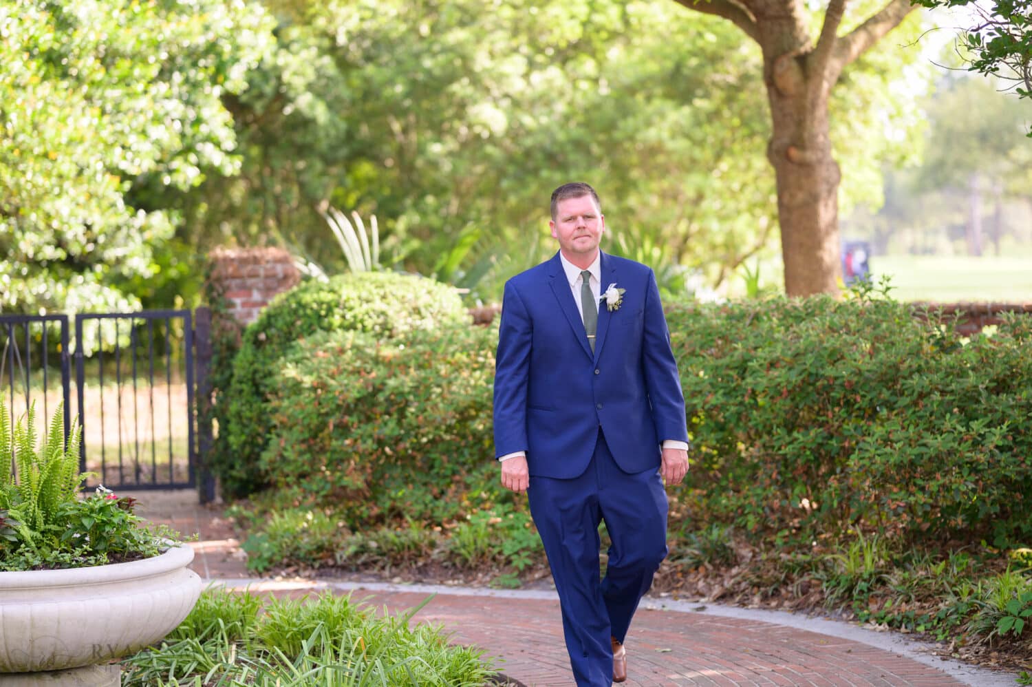 Groom walking to the ceremony - Pine Lakes Country Club