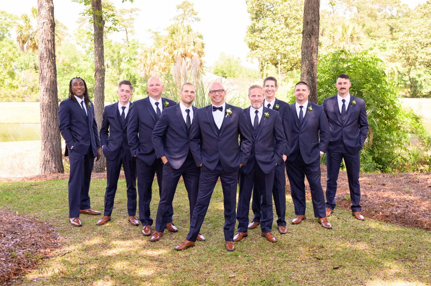 Groomsmen taking cool picture before the ceremony - The Village House at Litchfield