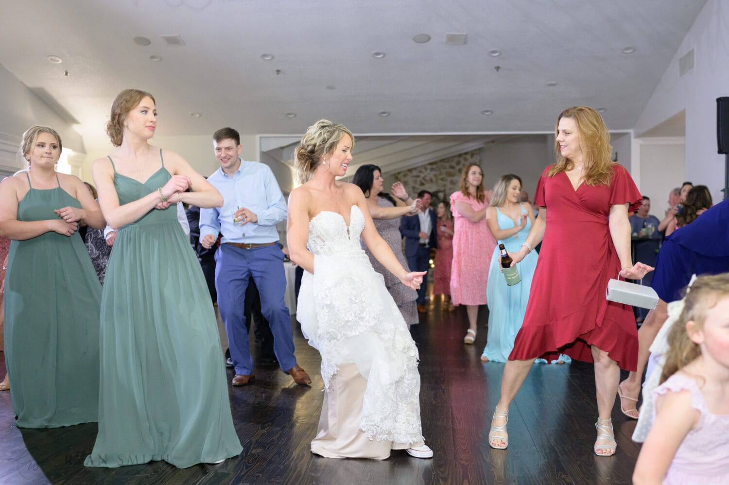 Lots of fun on the dance floor during the reception - The Village House at Litchfield