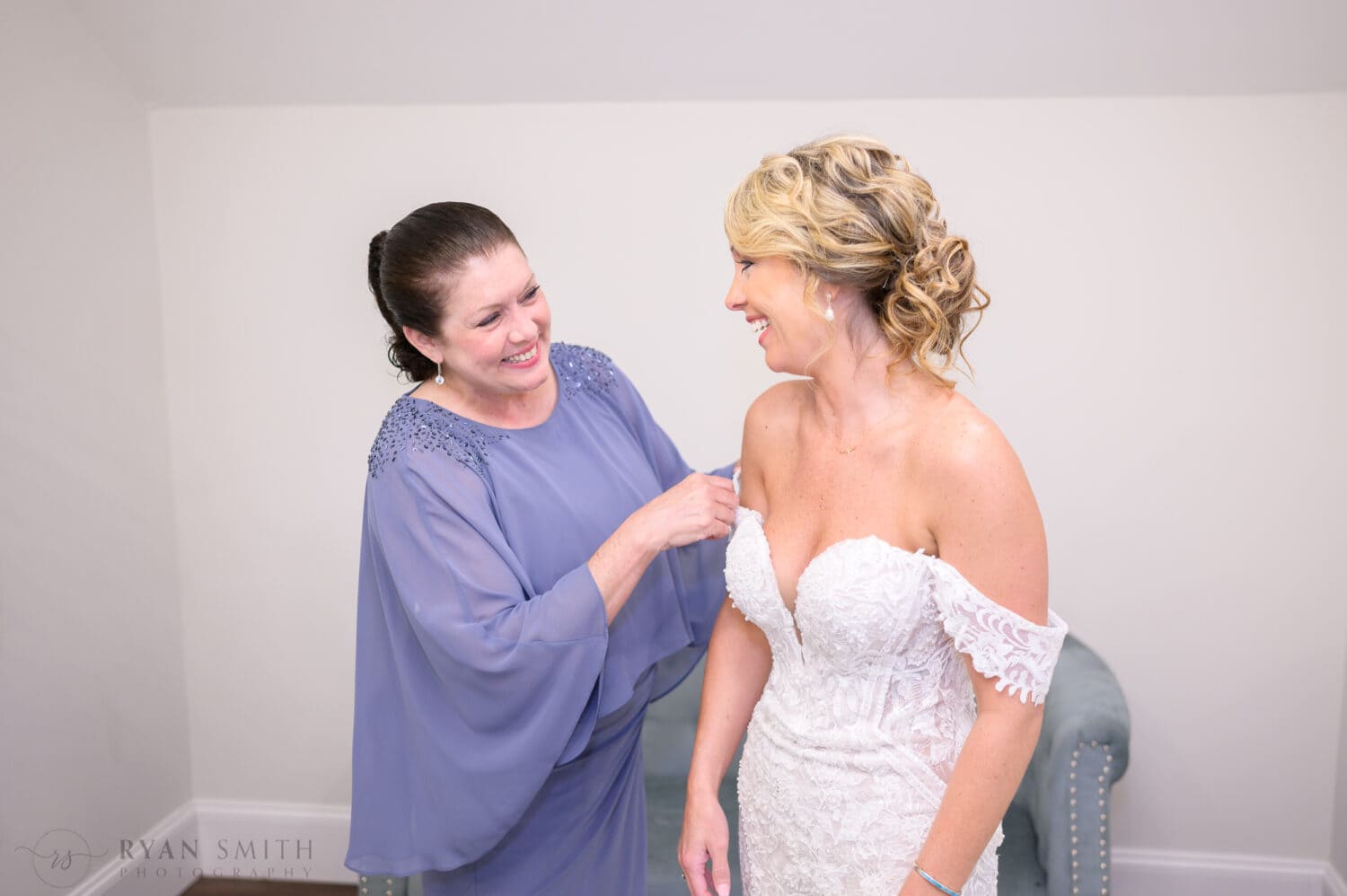 Mom helping bride get ready - The Village House at Litchfield