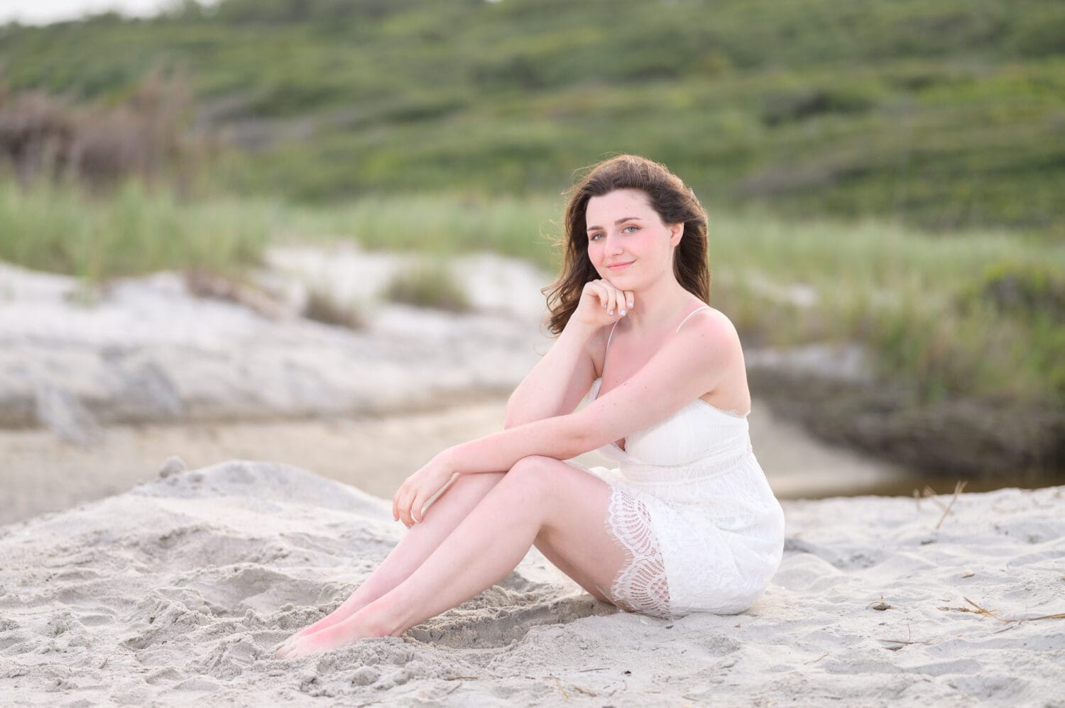 Senior portrait laying in the sand - Myrtle Beach State Park