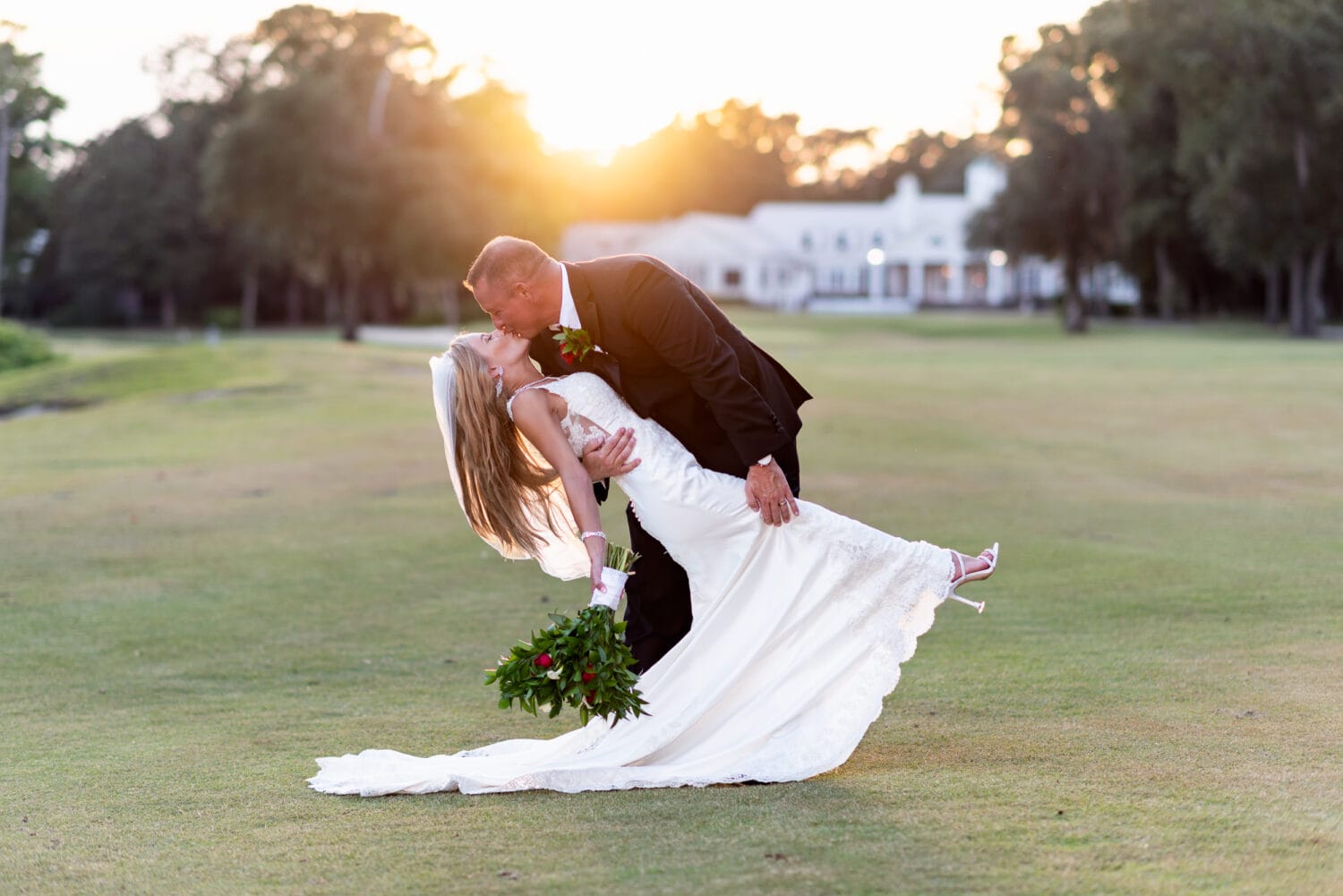 Dip in the sunset behind the clubhouse - Pawleys Plantation Golf & Country Club