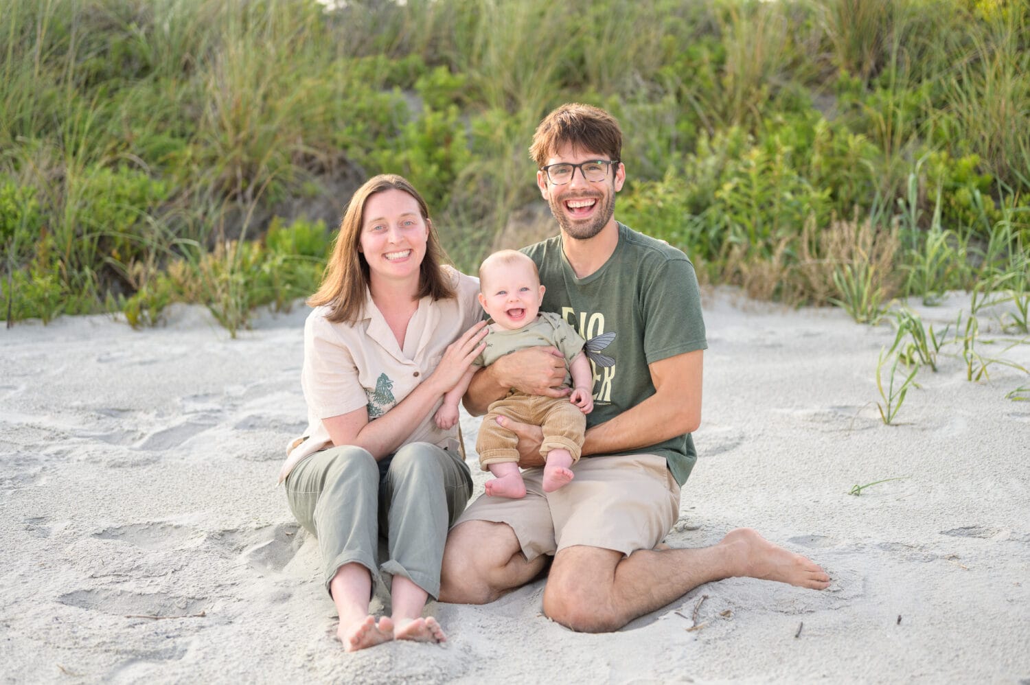 Happy baby with mom and dad by the dunes - North Myrtle Beach