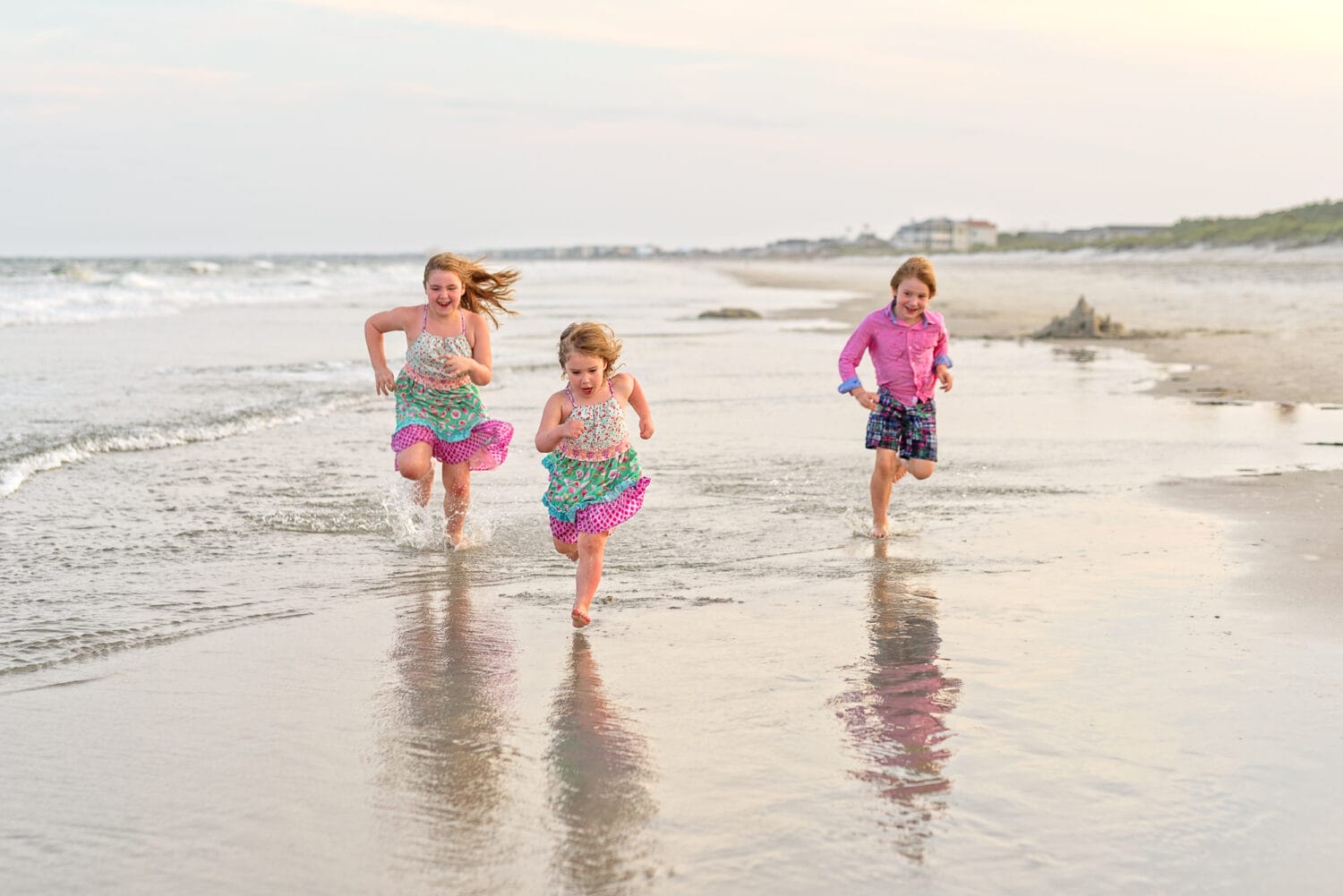 Kids racing down the beach - Huntington Beach State Park