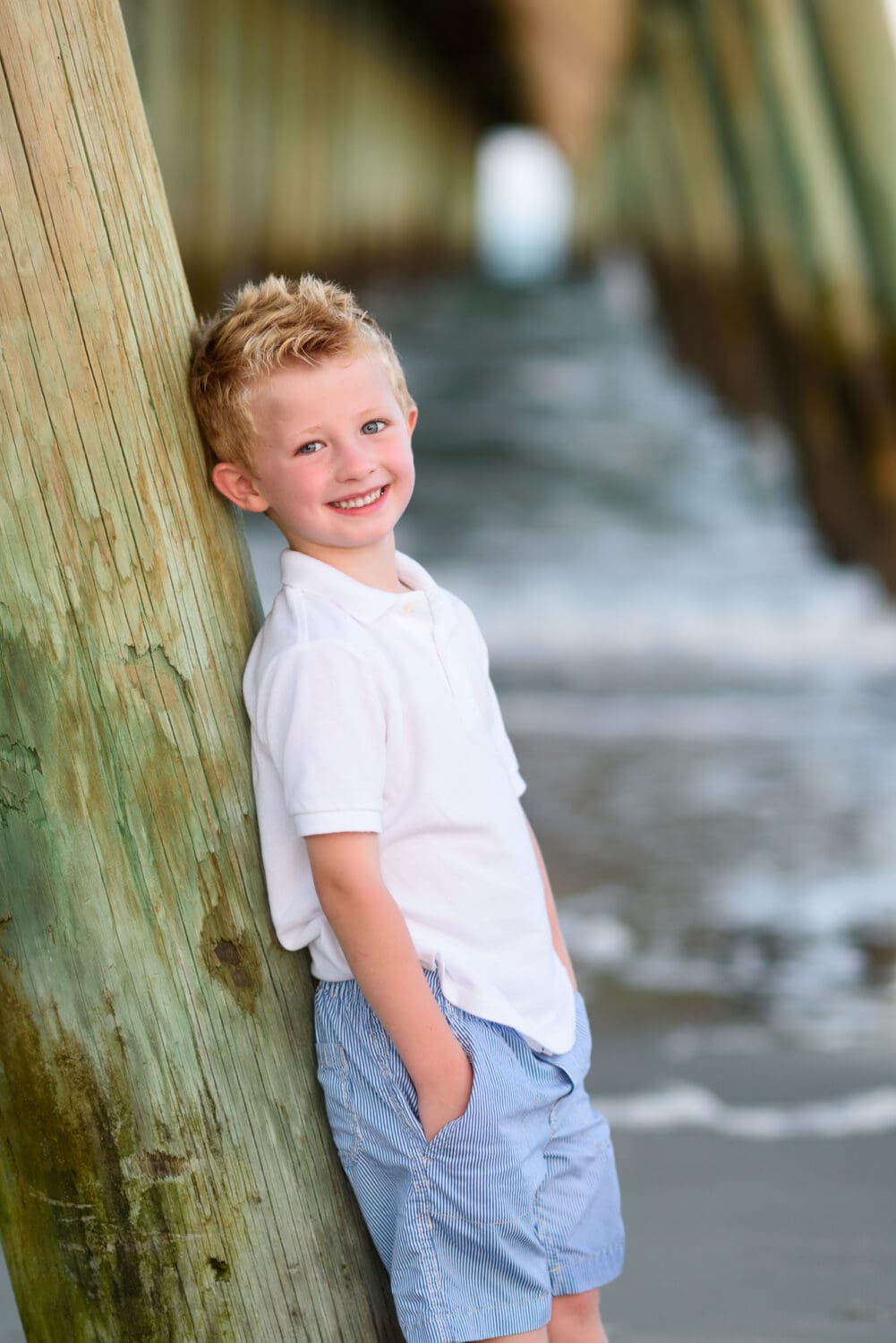 Little boy under the pier - Myrtle Beach State Park