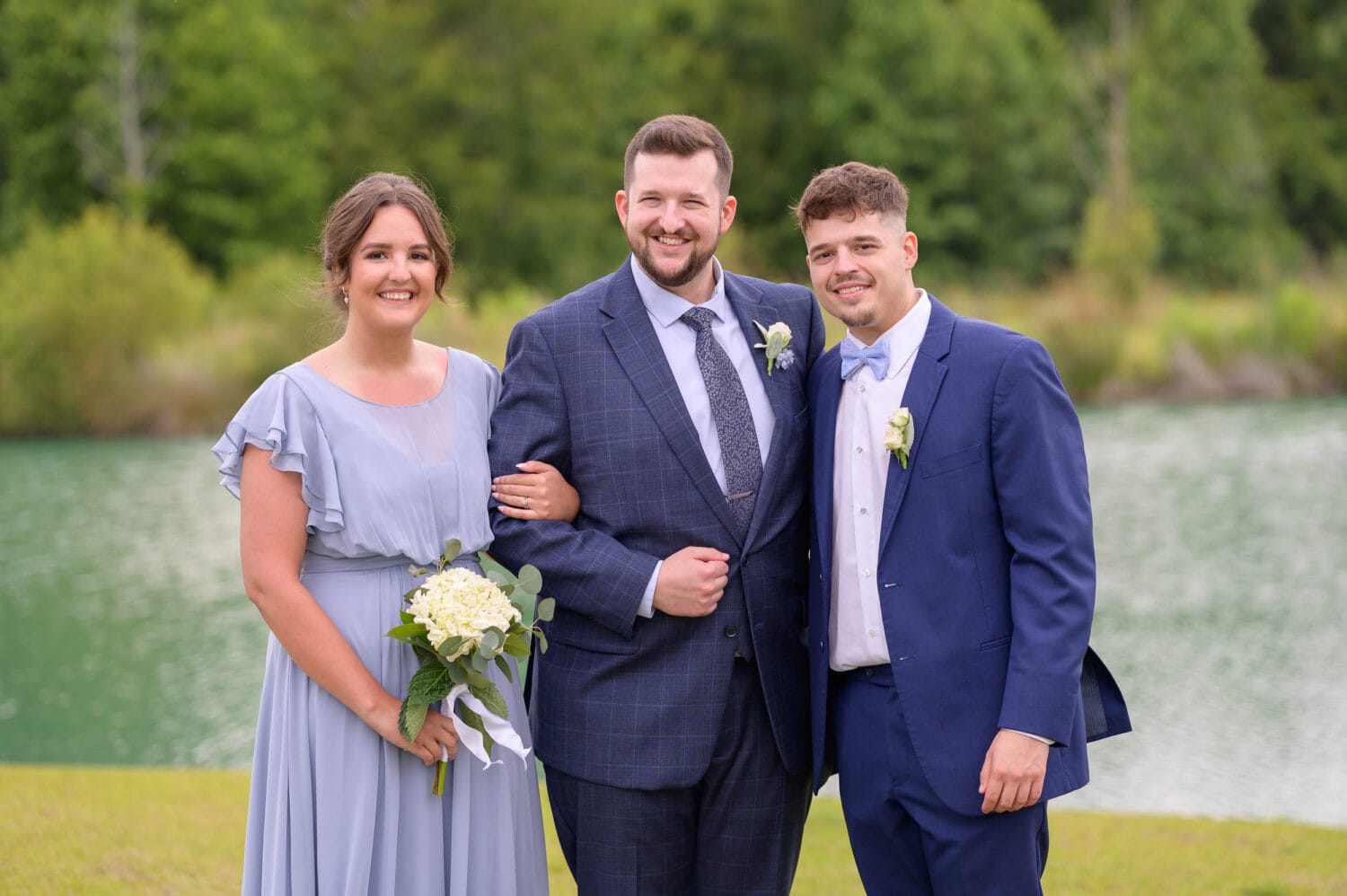 Groom with his brother and sister - The Venue at White Oaks Farm