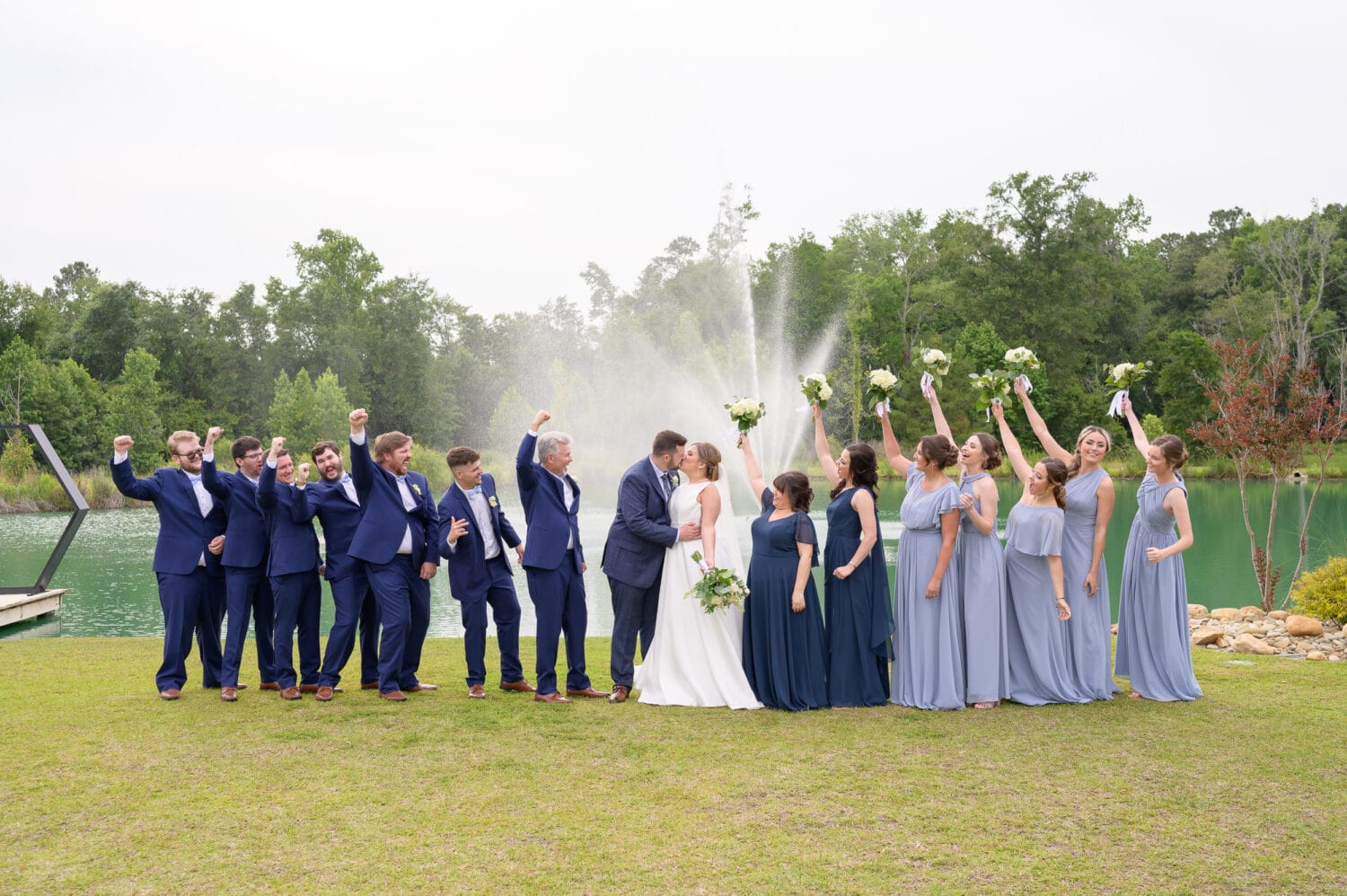 Pictures with the wedding party by the lake - The Venue at White Oaks Farm