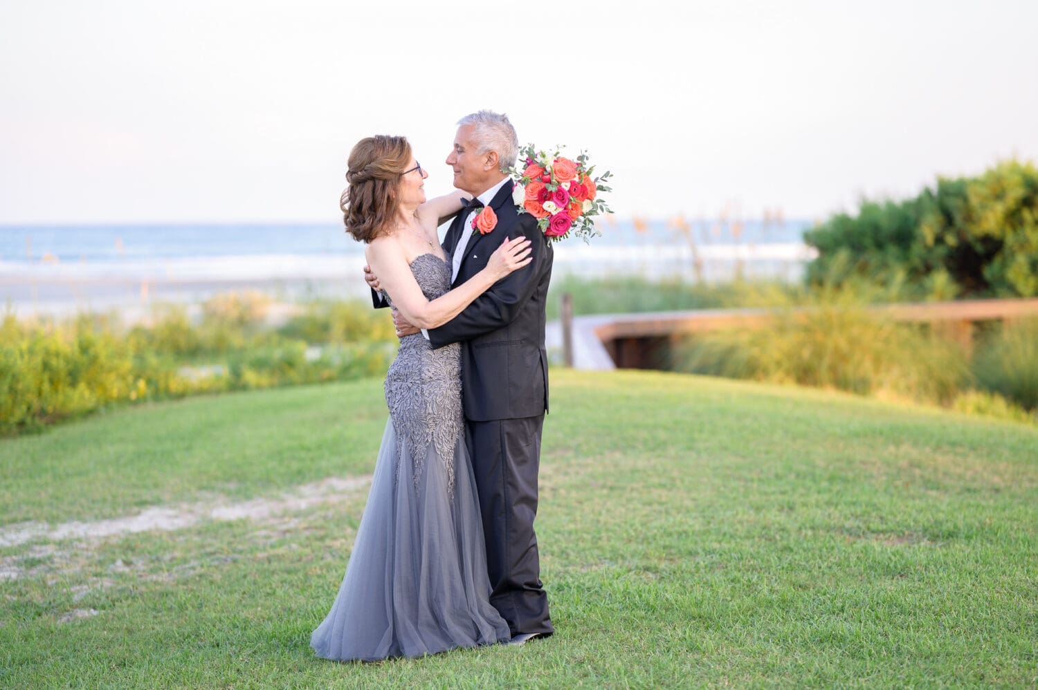 Romantic senior couple after their intimate wedding on the beach - Dunes Golf & Beach Club