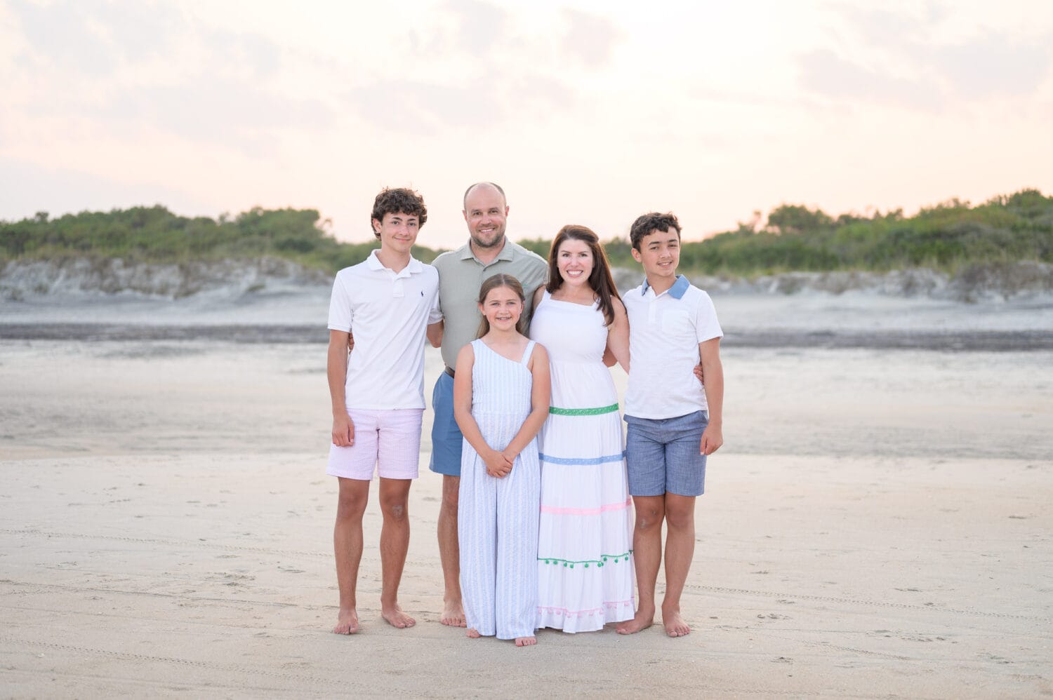 Beautiful sunset behind the dunes for family pictures - Huntington Beach State Park
