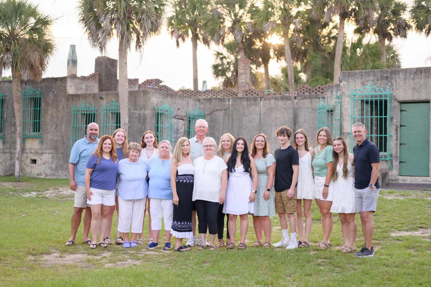 Big family group with adult children by the Atalaya CAstle - Huntington Beach State Park