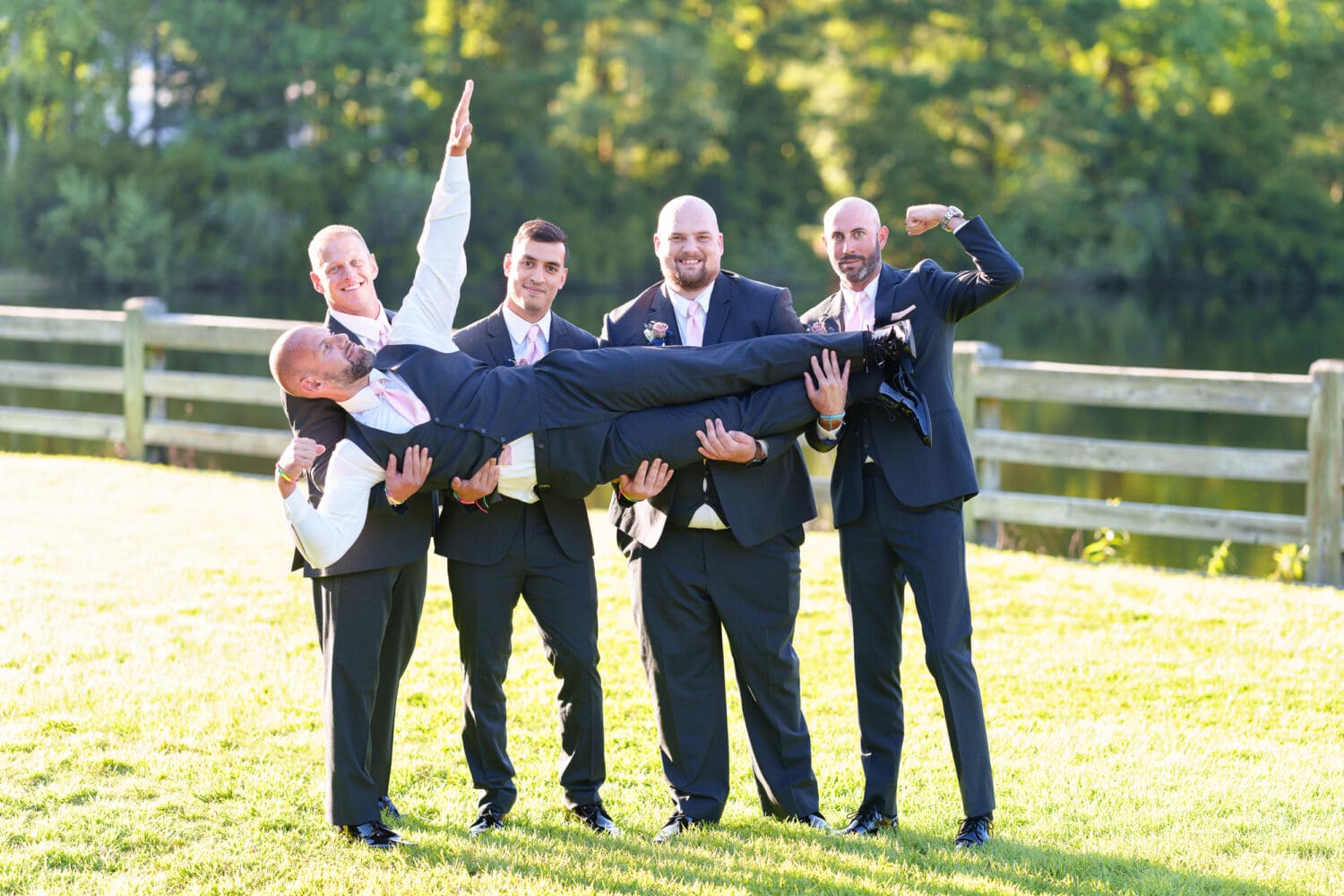 Bodybuilding groomsmen having fun for the pictures - The Pavilion at Pepper Plantation
