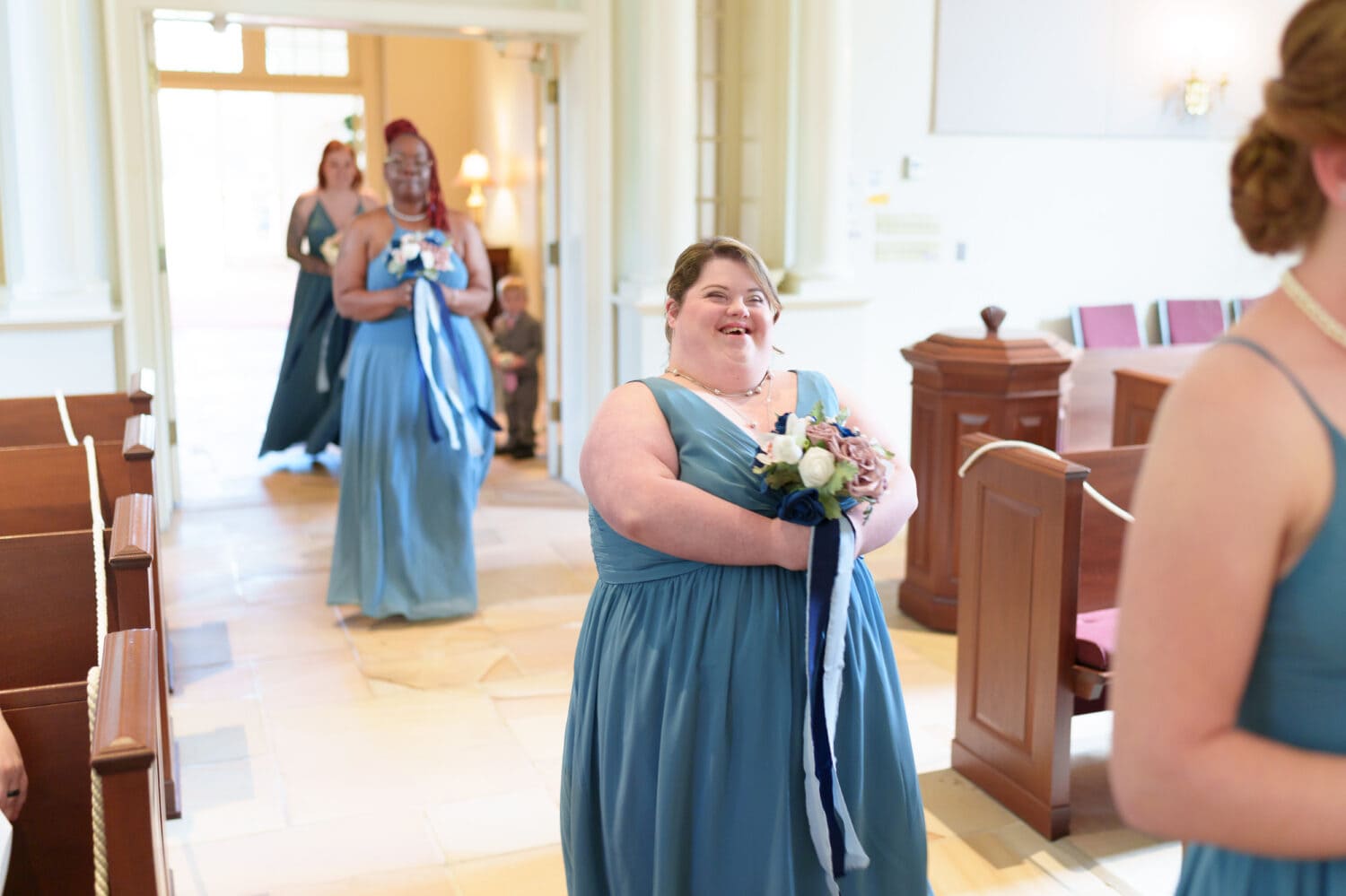 Bridesmaids walking down the aisle - Christ Episcopal Church