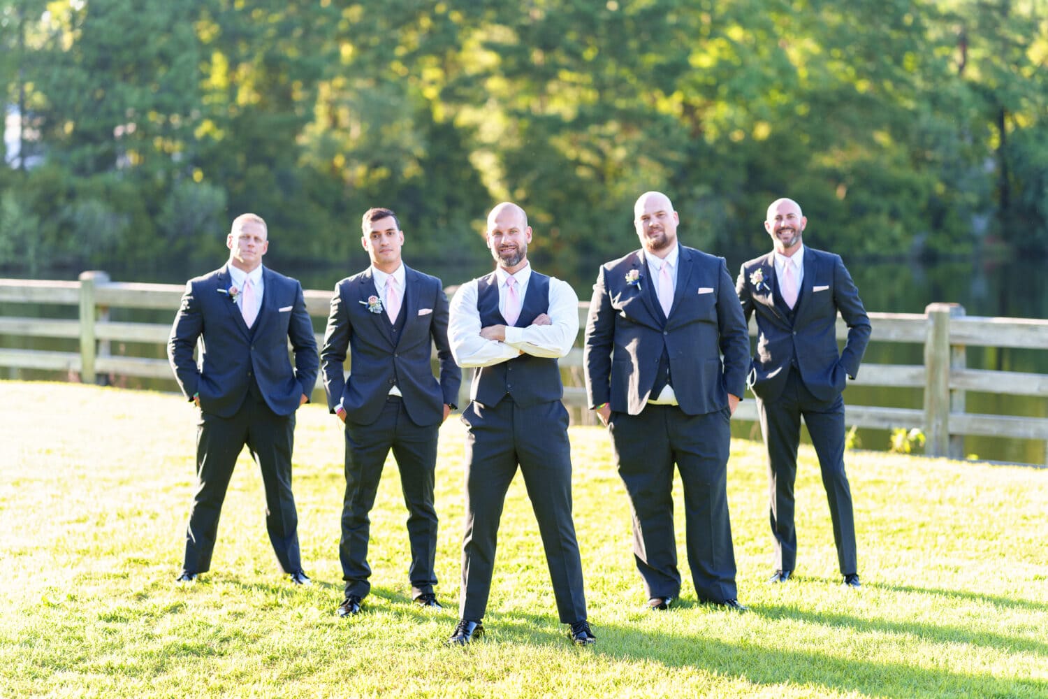 Flying V pose with the groomsmen - The Pavilion at Pepper Plantation