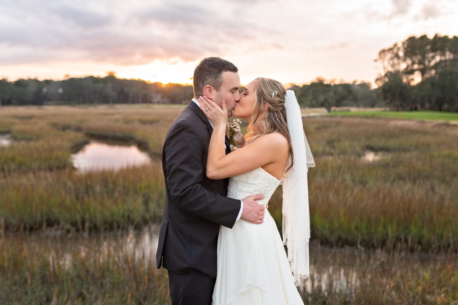 Pulling him in close for a kiss - Pawleys Plantation Golf & Country Club