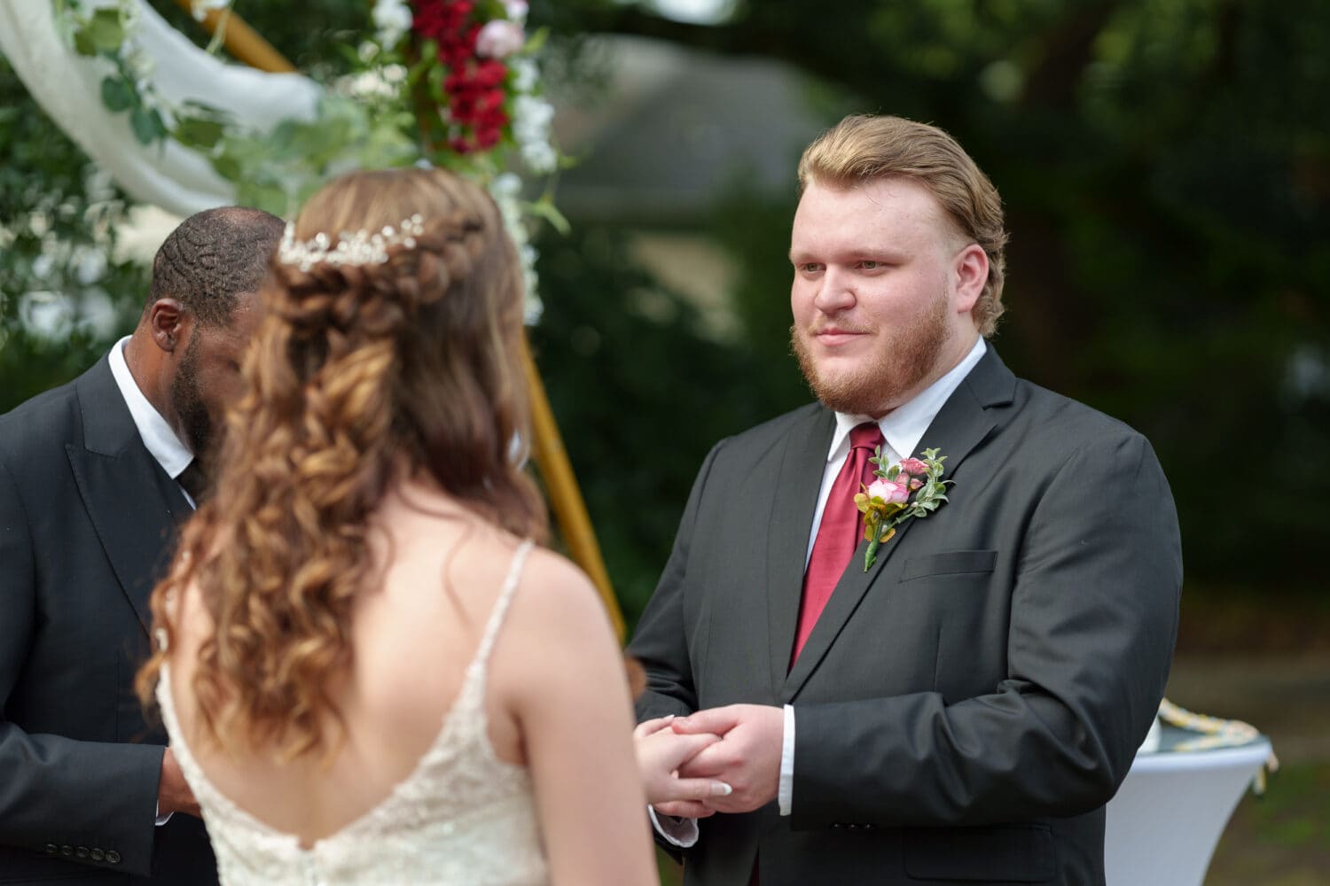 Groom listening to the bride's vows - Litchfield Country Club