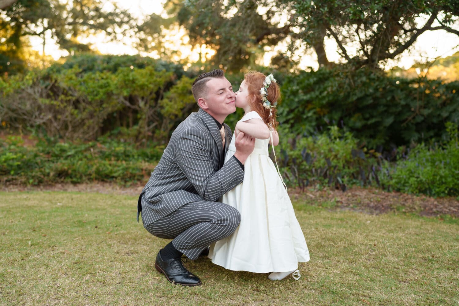 Groom getting hugs from his little daughter after the ceremony - Litchfield Country Club
