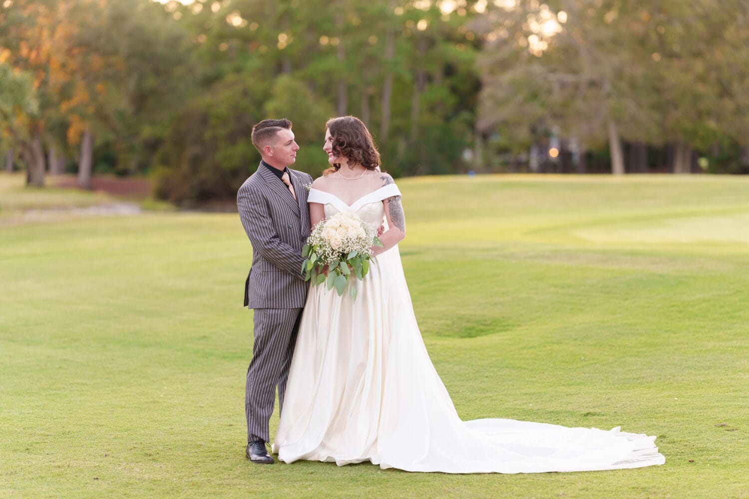 Groom with his arms around the bride - Litchfield Country Club