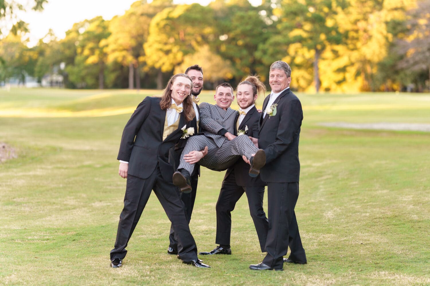Groomsmen picking up the groom - Litchfield Country Club