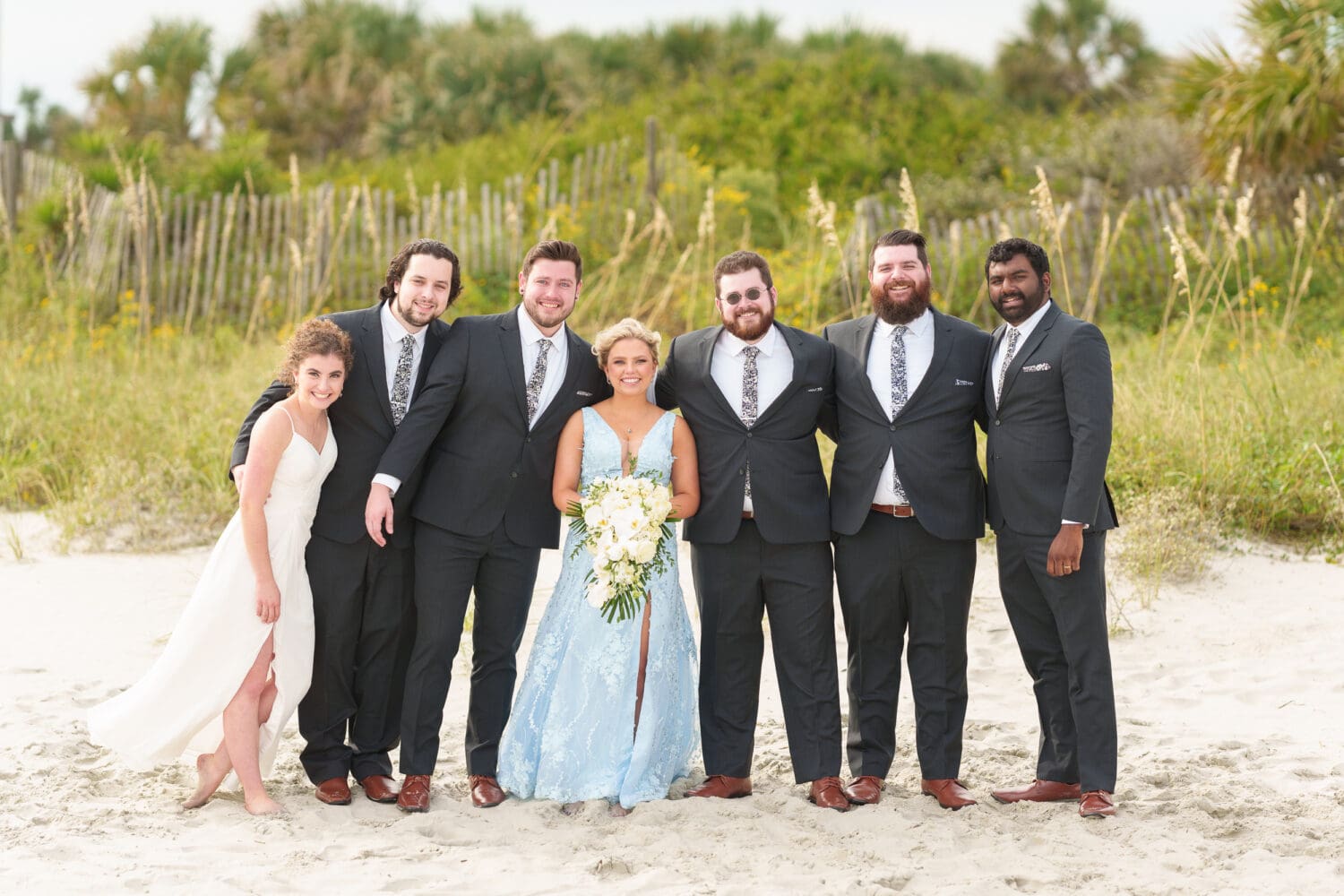 Bride with the groomsmen - Hilton Myrtle Beach Resort