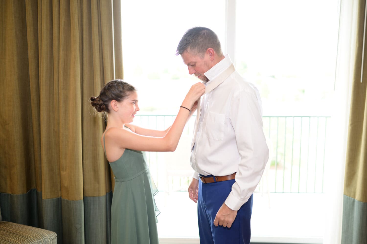 Helping dad with his tie - The Marina Inn