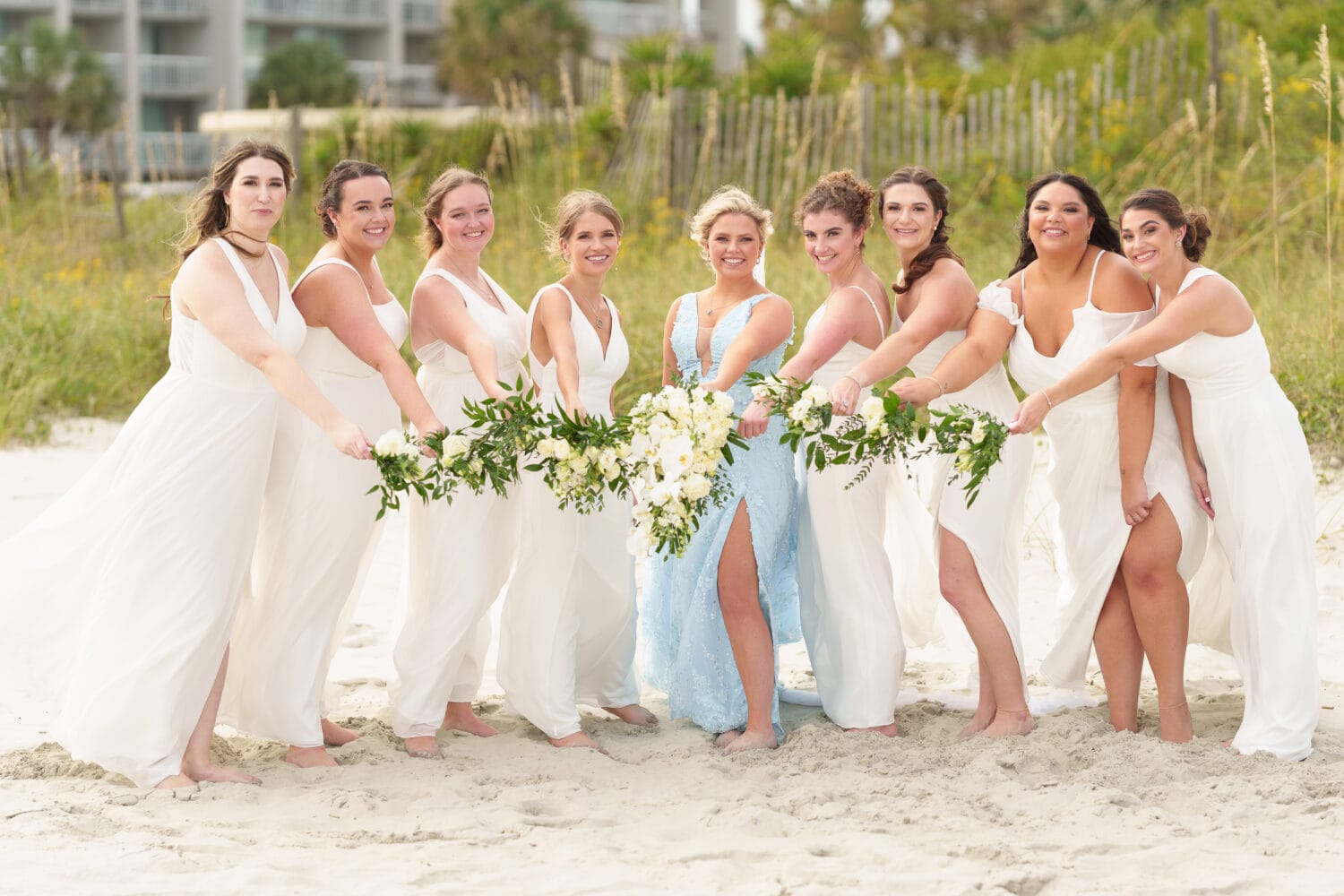 Pictures with the bridesmaids on a windy day - Hilton Myrtle Beach Resort