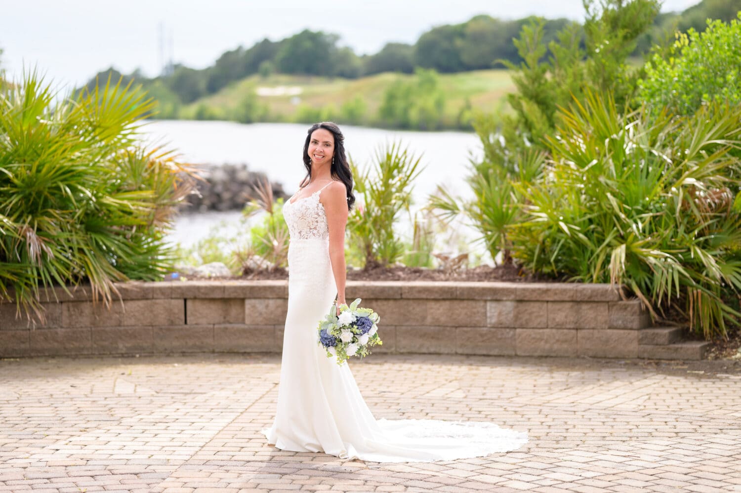 Portraits of bride by the water on the marina - The Marina Inn