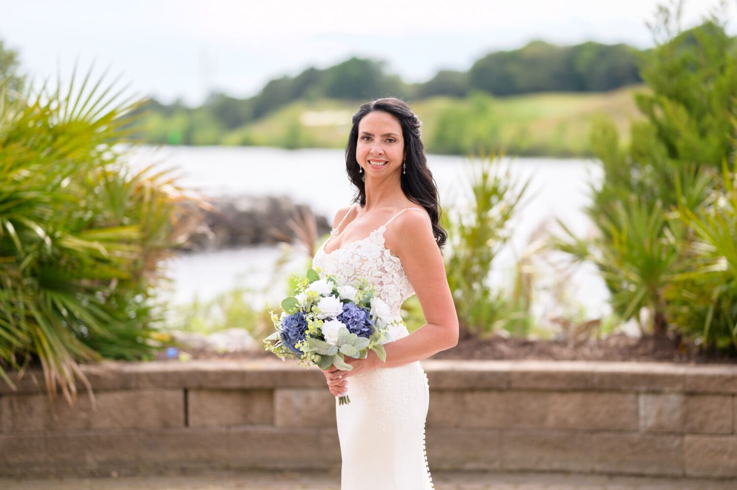 Portraits of bride by the water on the marina - The Marina Inn