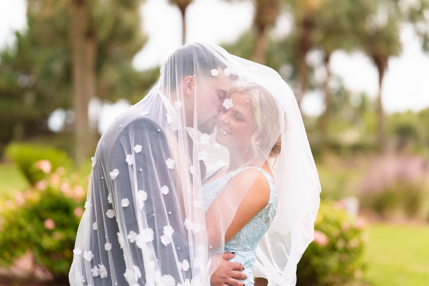 Portraits of the bride and groom on the lawn before the ceremony - Hilton Myrtle Beach Resort