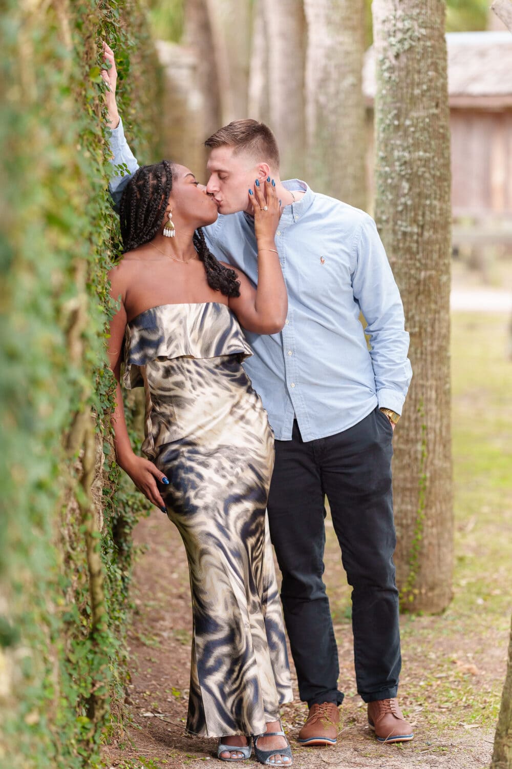 Romantic kiss by the ivy wall - Huntington Beach State Park
