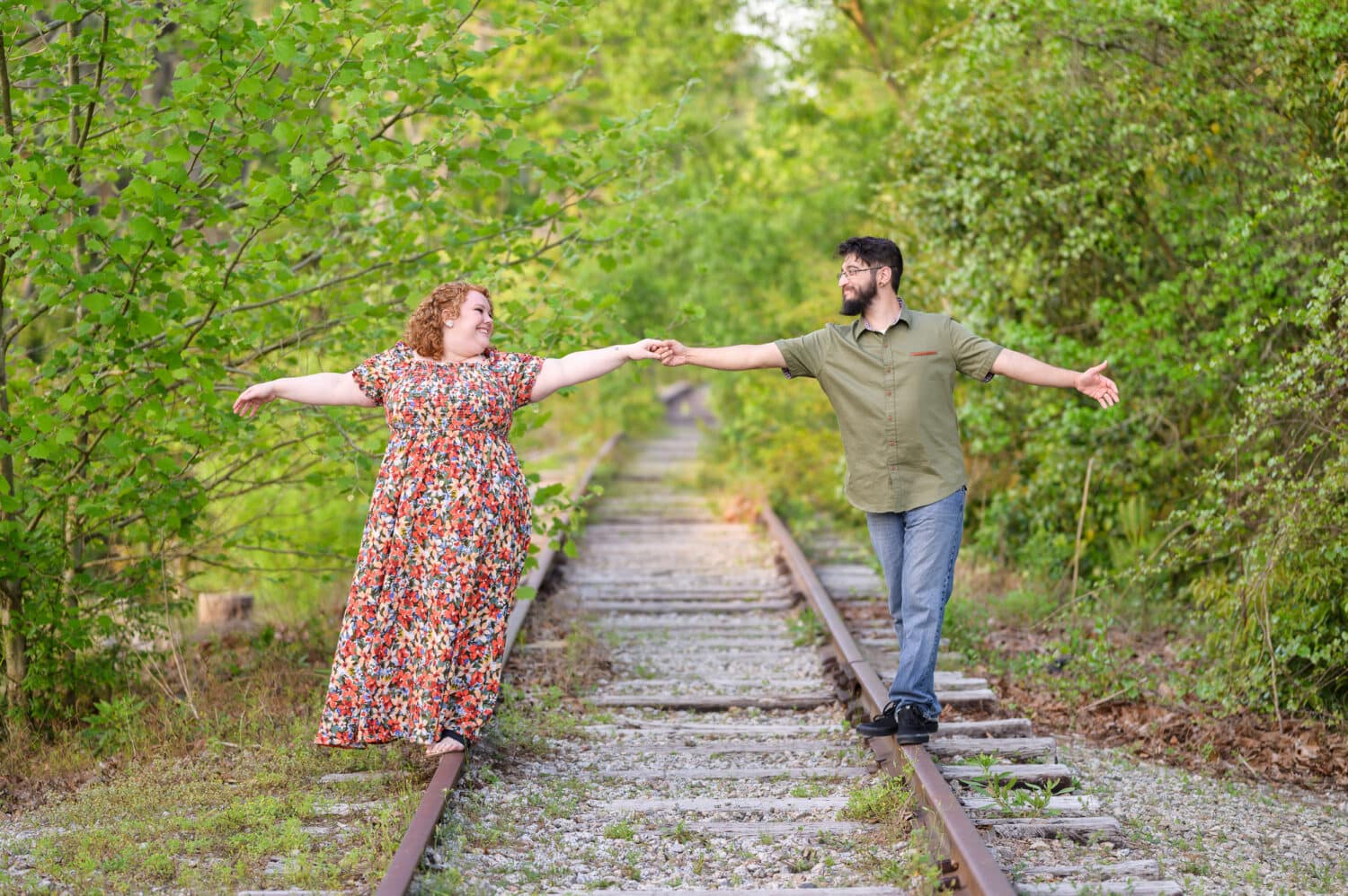 Walking down the train tracks together - Conway Riverwalk
