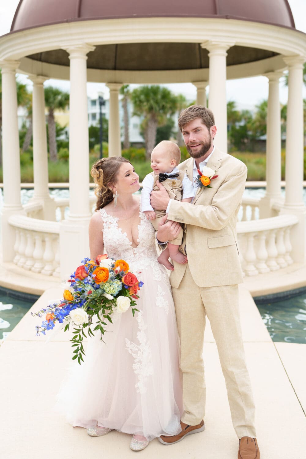 Bride and groom with their happy baby boy - 21 Main Events - North Myrtle Beach
