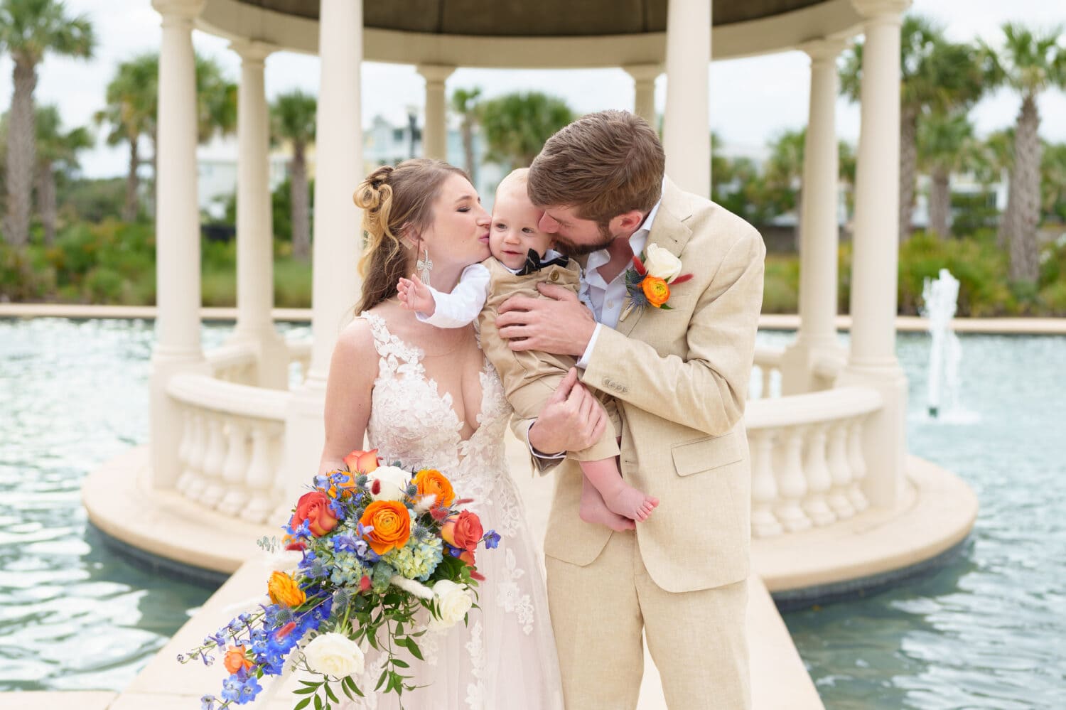 Bride and groom with their happy baby boy - 21 Main Events - North Myrtle Beach